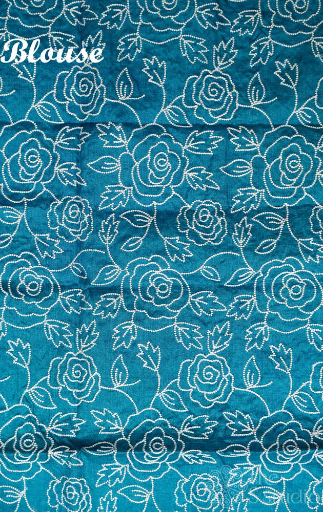 Shades of blue tussar silk saree with white embroidery and scallop border