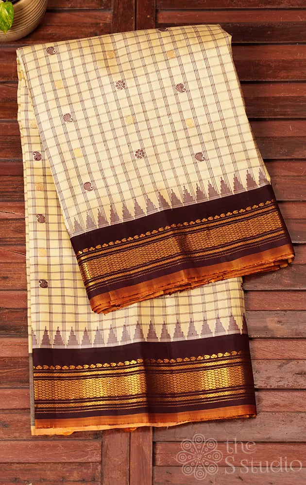 Off white checked gadwal silk saree with brown border