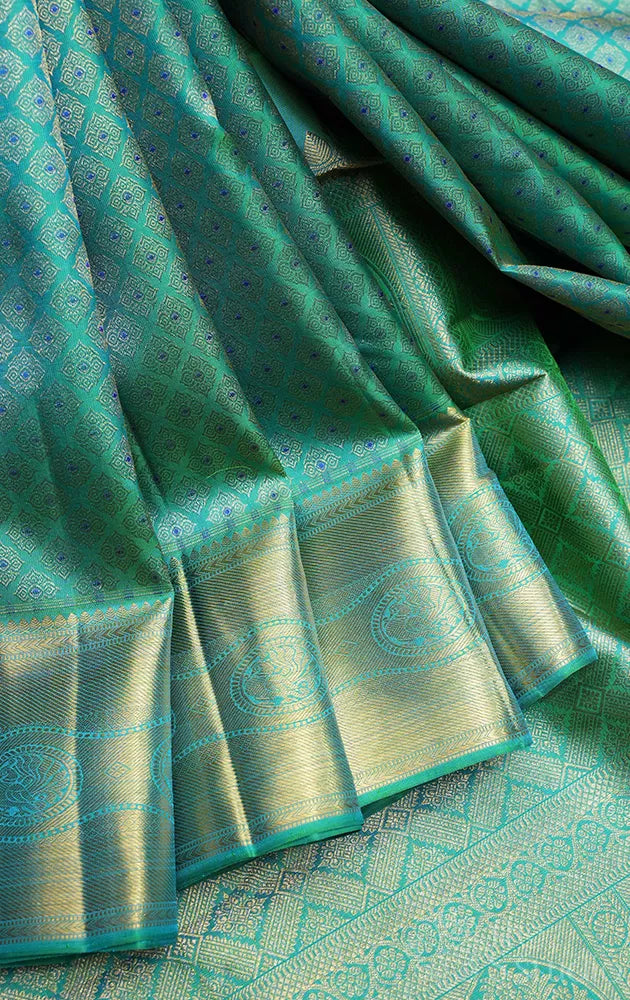 Sea green kanchipuram silk saree with all over design