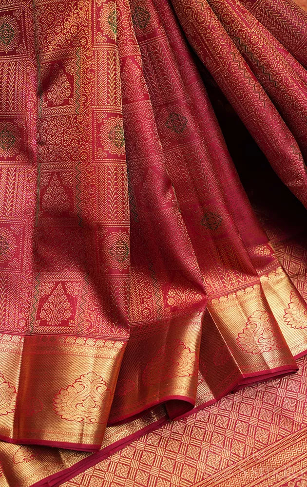 Maroon bridal kanchipuram silk saree with zari border