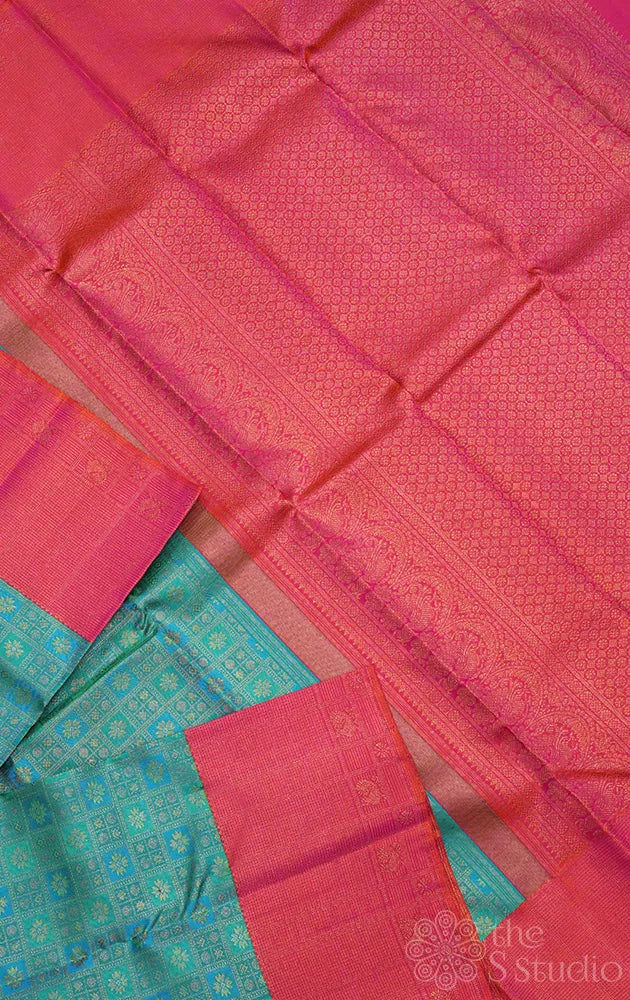 Aqua blue and pastel green kanchi pattu saree with peach big border