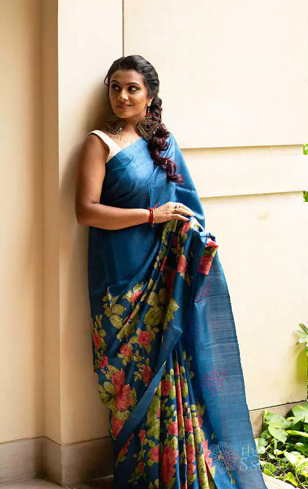 Blue tussar saree with embroidery and floral prints