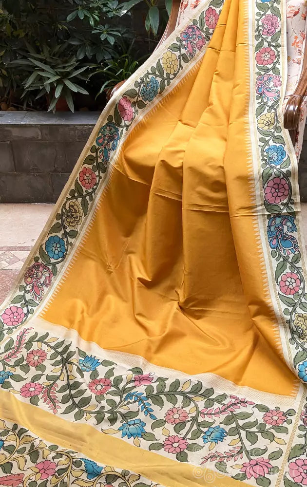 Mustard kanchipuram silk saree with offwhite handpainted kalamkari border