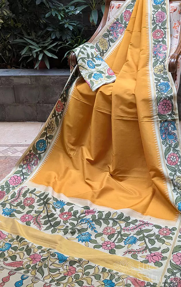 Mustard kanchipuram silk saree with offwhite handpainted kalamkari border