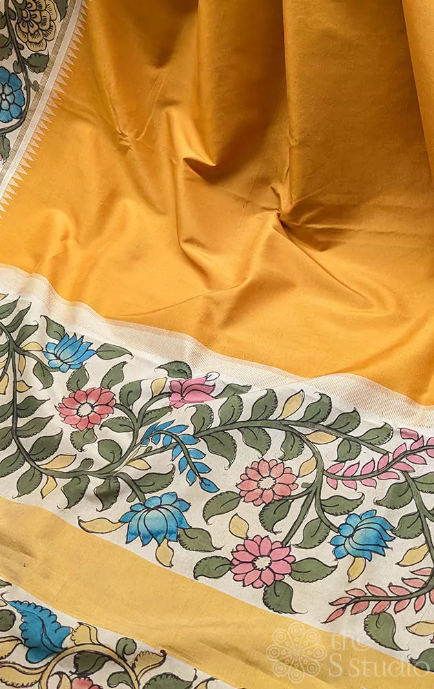 Mustard kanchipuram silk saree with offwhite handpainted kalamkari border