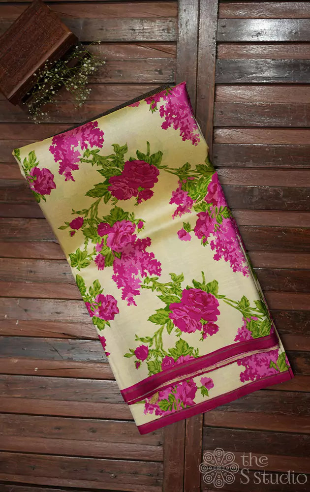Cream kanchipuram silk saree with rani pink prints