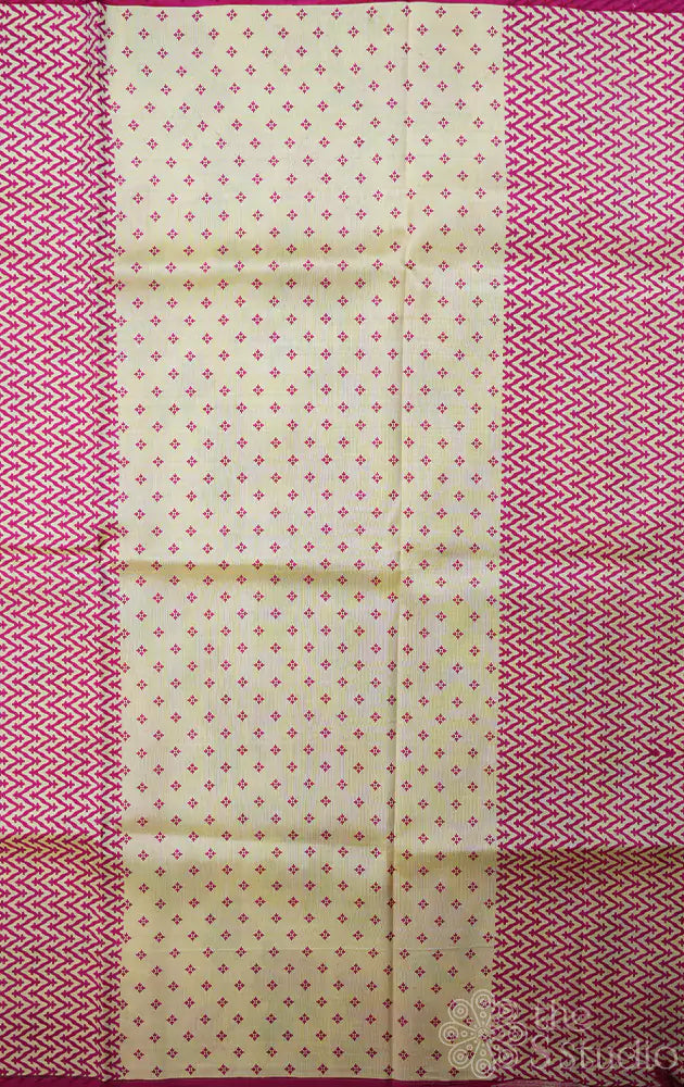 Cream kanchipuram silk saree with rani pink prints