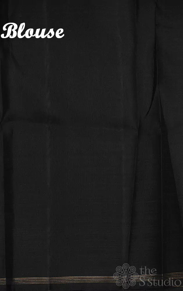 White kanchi pattu saree with floral prints and black pallu