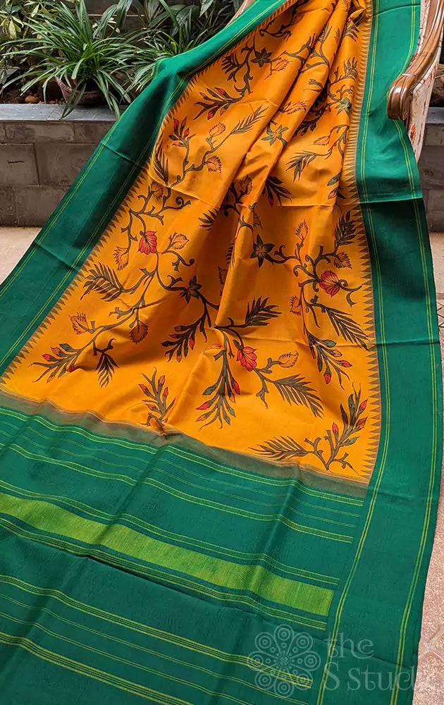 Mustard yellow kanchi pen kalamkari saree with korvai green border
