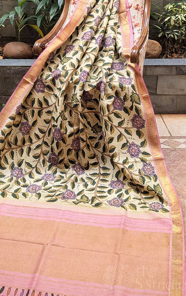 Off white floral hand painted kalamkari saree with pale pink zari border