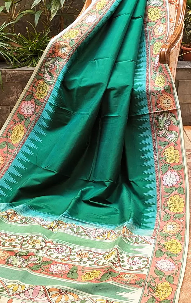 Green kanchi silk saree with hand painted kalamkari border