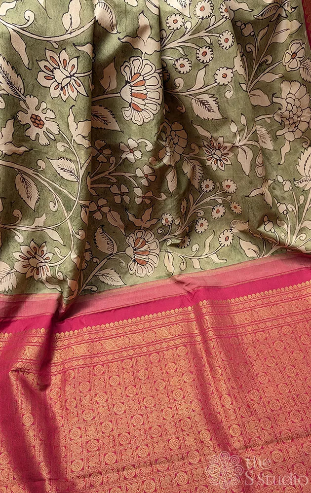 Olive green coloured kanchi hand painted kalamkari saree with korvai red border