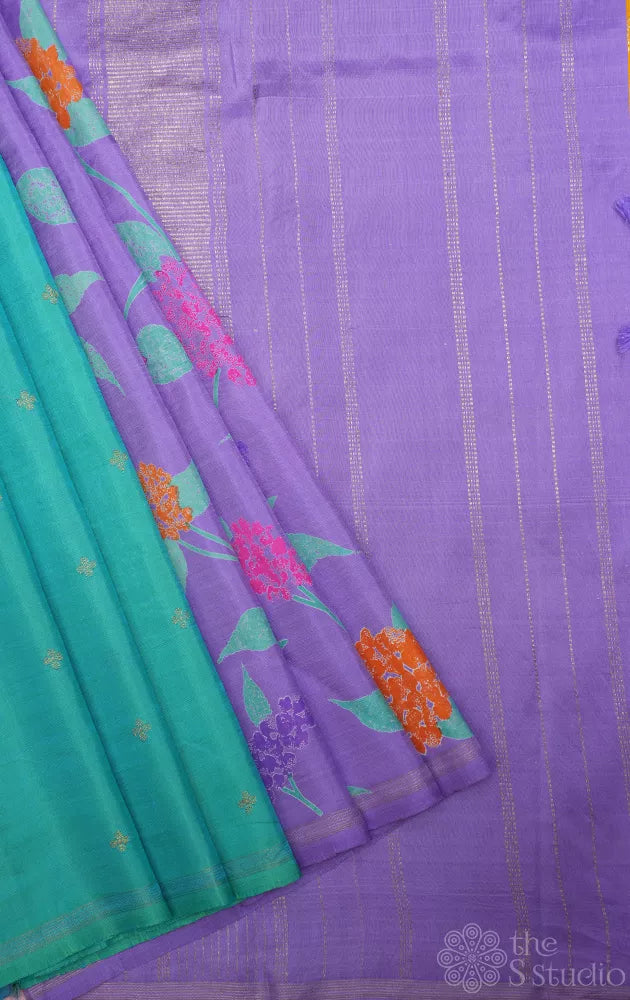 Lavendar and sea green reversible half and half kanchipuram silk saree with floral prints