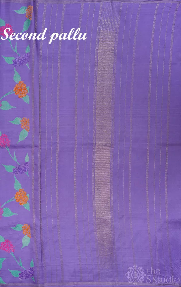 Lavendar and sea green reversible half and half kanchipuram silk saree with floral prints
