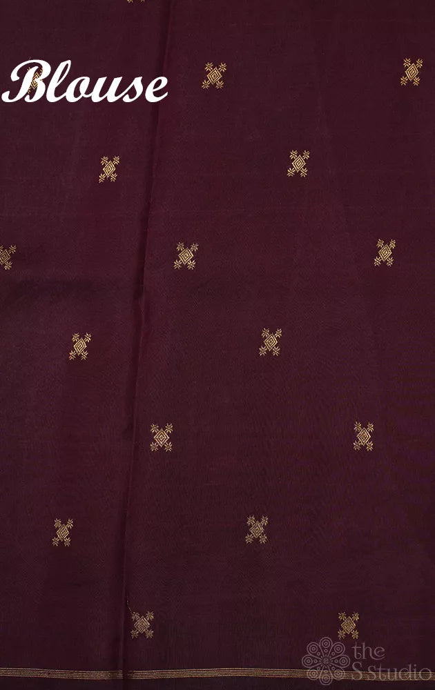 Rust kanchipuram silk saree with brown zari butta woven pallu