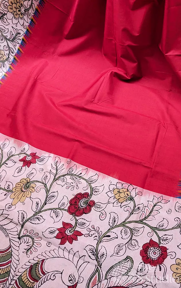 Red pochampally ikat silk saree with pen kalamkari border