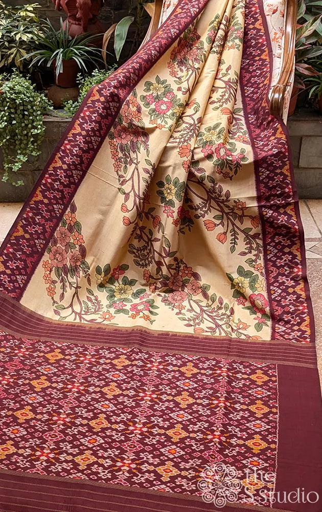 Beige hand painted kalamkari ikkat silk saree with brown ikkat border