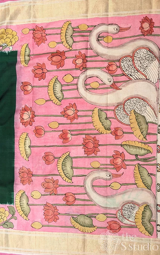 Green pochampally ikat silk saree with pink pen kalamkari border