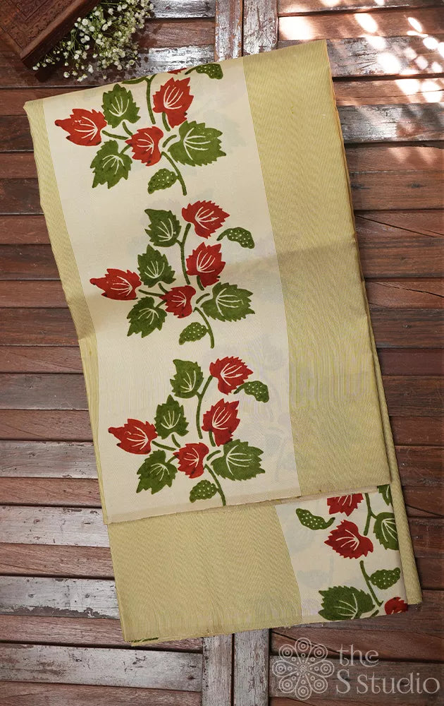 Golden beige and white kanchi silk saree with floral prints