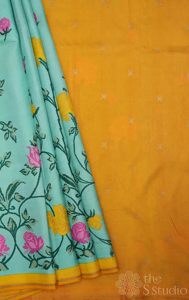 Aqua blue printed kanchi pattu saree with yellow pallu