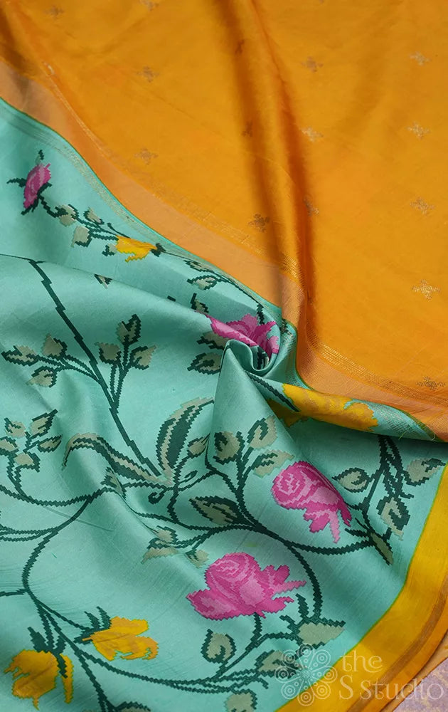 Aqua blue printed kanchi pattu saree with yellow pallu