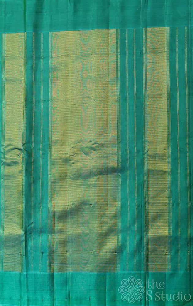 Off white gadwal silk saree with teal green temple border