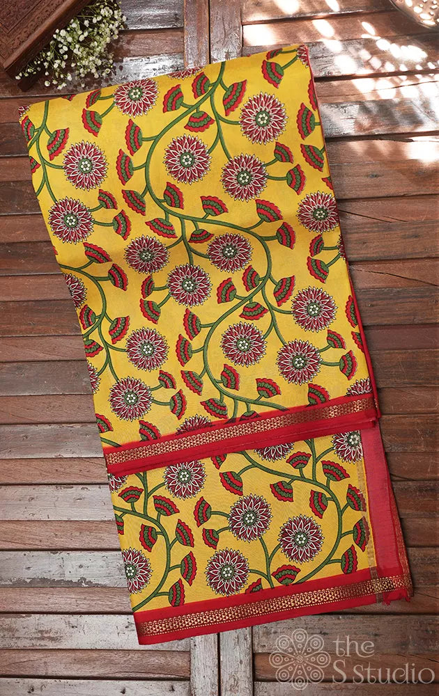 Yellow kanchipuram silk saree with floral print and red pallu