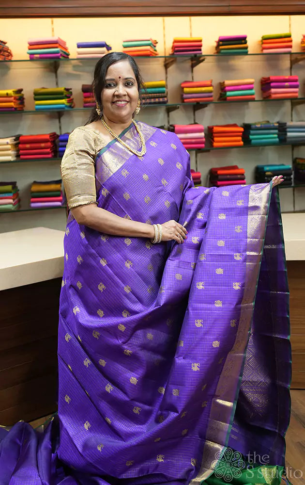 Violet zari checked kanchipuram silk saree with yazhi motifs