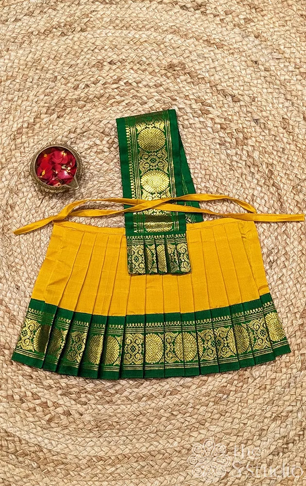 Yellow 8 Inch goddess vasthram with green getti zari border