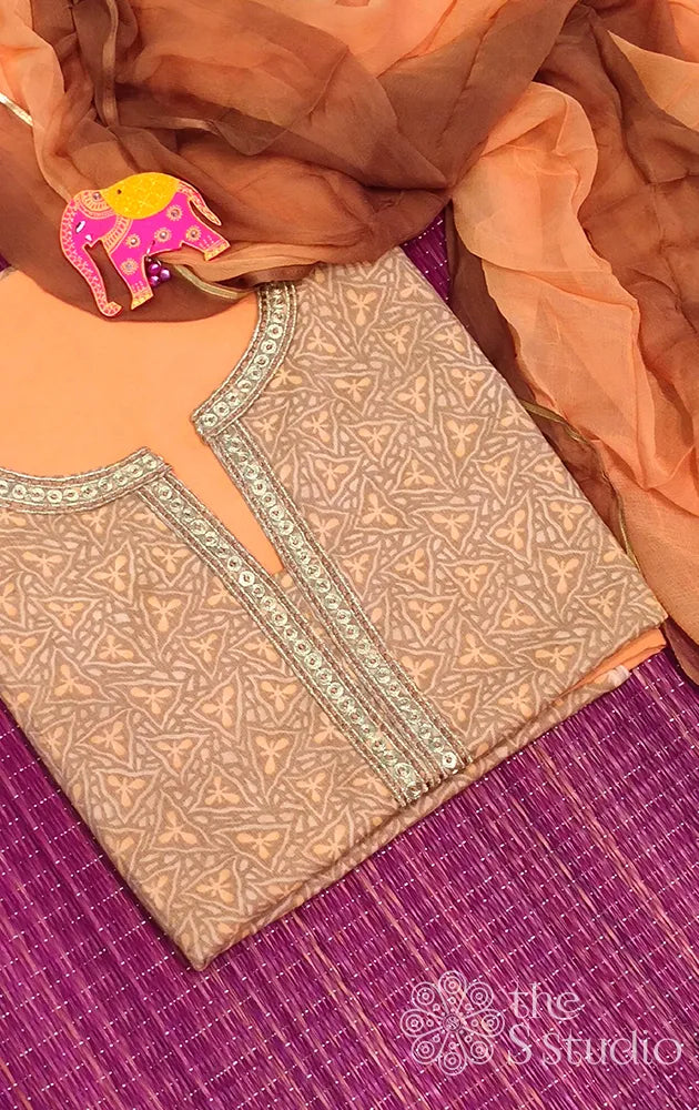 Light orange printed salwar set with embroidery