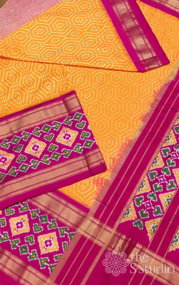 Mango orange ikkat silk saree with rani pink border
