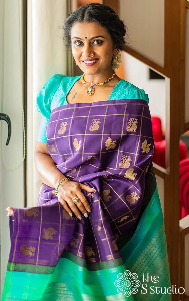 Aubergine colour kanchi pattu saree with checks and buttas