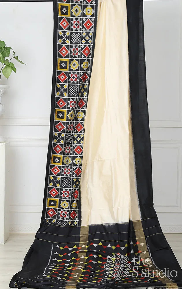 Off white pochampally ikkat silk saree with black border