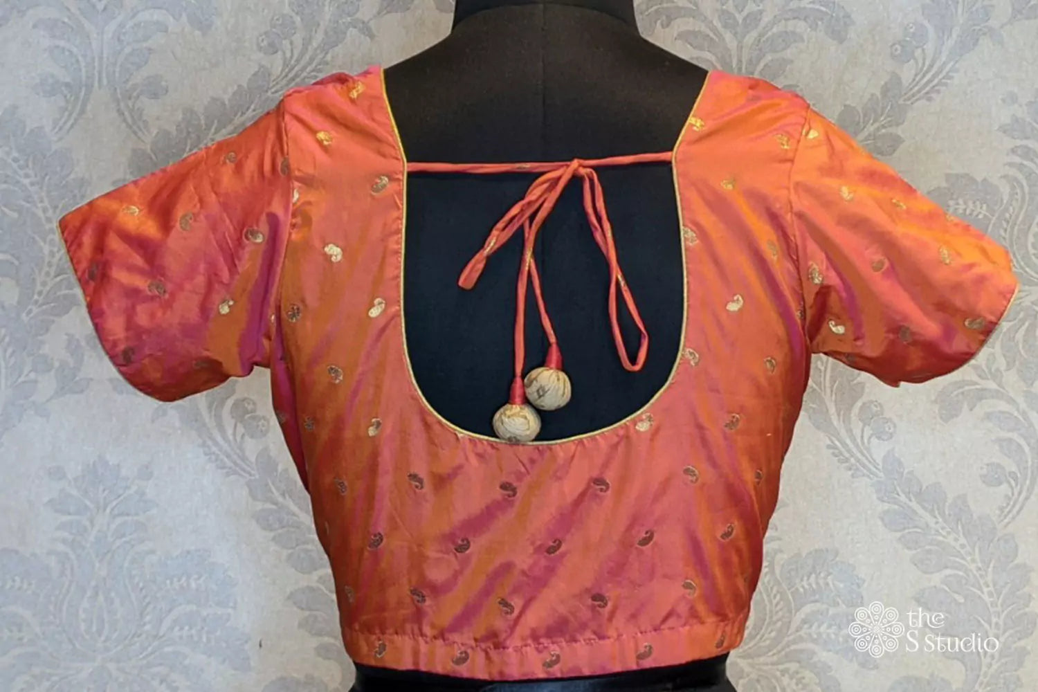 Peach with zari bhuttas silk blouse