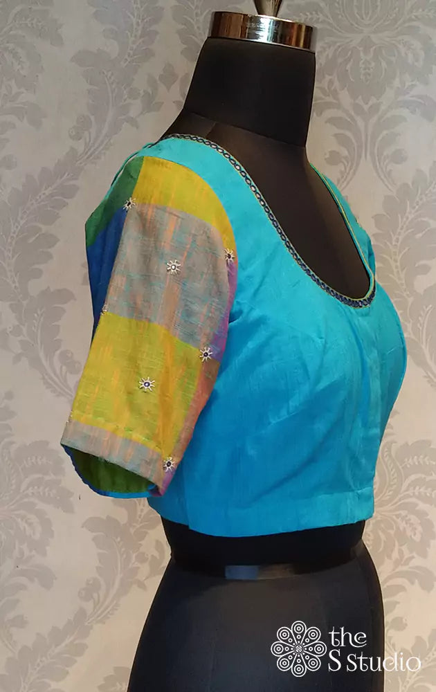 Blue cotton blouse with checked sleeves