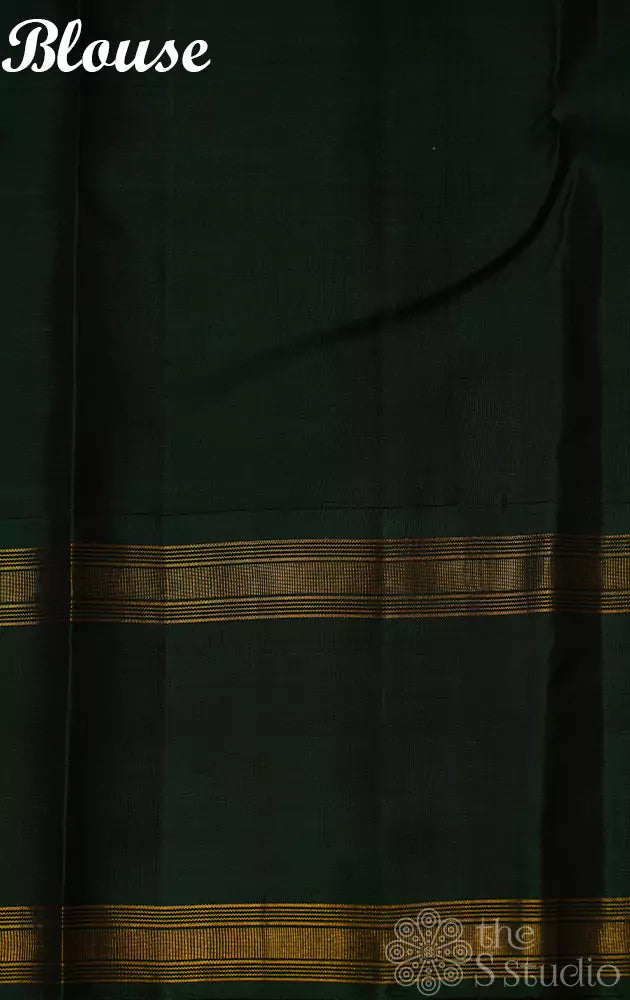 Yellow kanchi silk saree with rettapet korvai green border