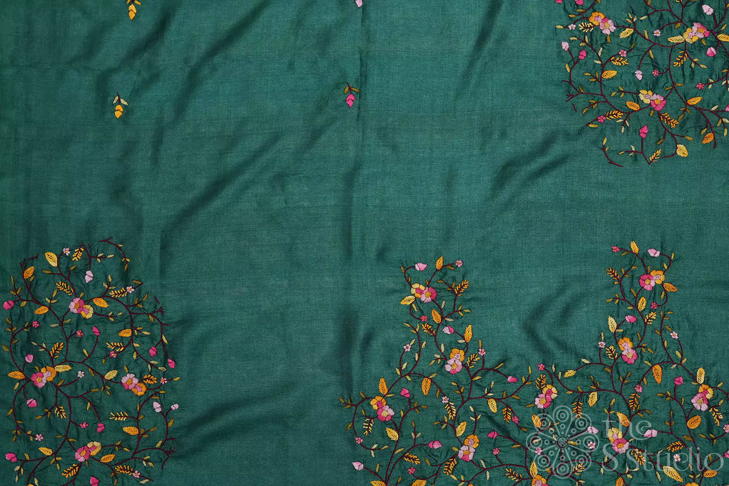 Green colored tussar material with floral kutch hand embroidery