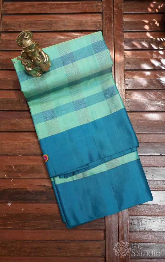 Bluish green checked kanchi silk saree with kutch hand embroidery