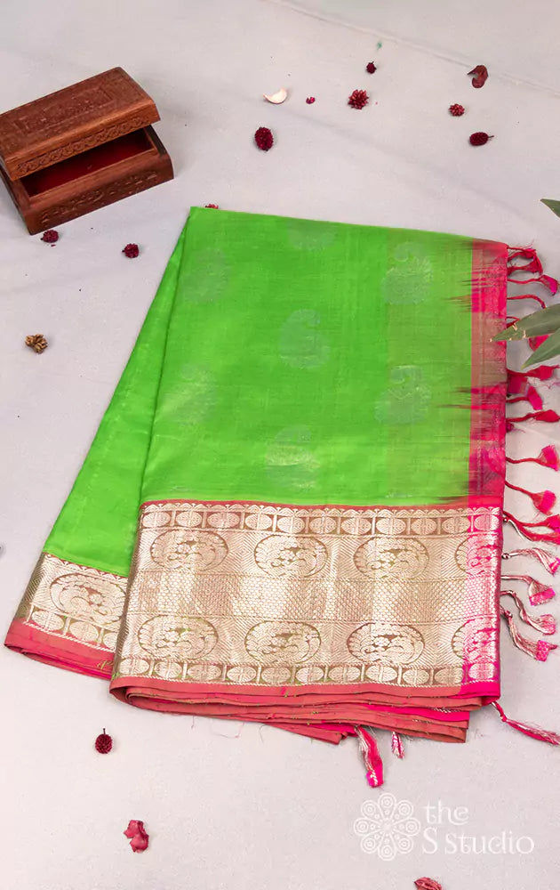 Parrot green silk cotton saree with silver zari border