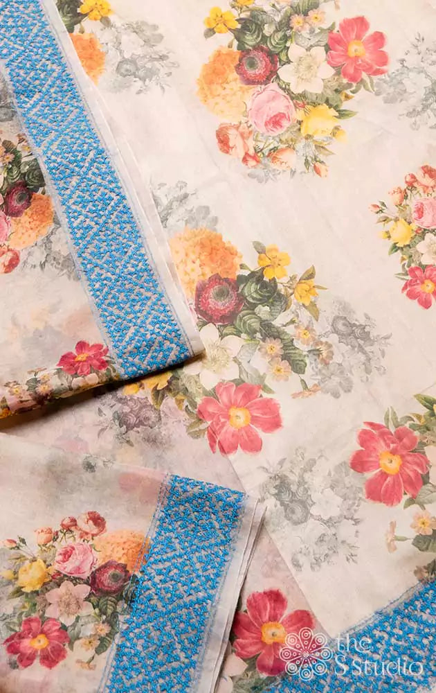 Beige printed organza saree with Kutch embroidered border