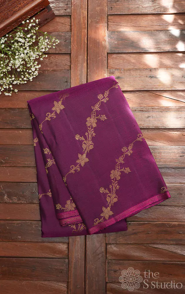 Purple with zari floral veins kanjivaram saree with contrast green pallu