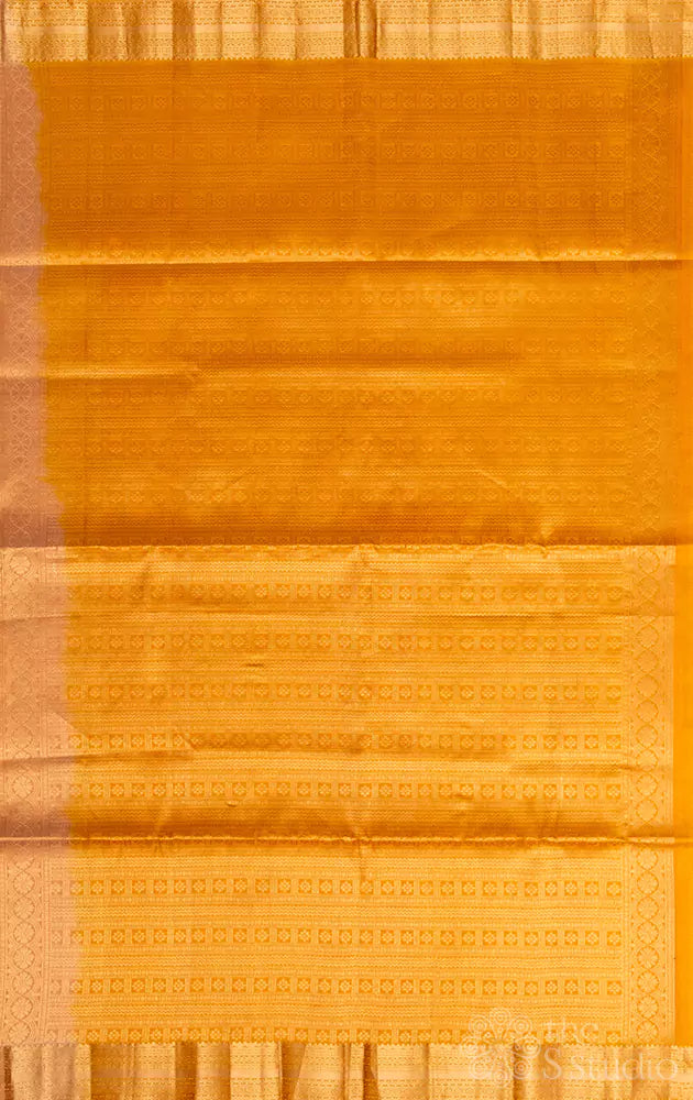 Beige small border soft silk saree with small buttas all over