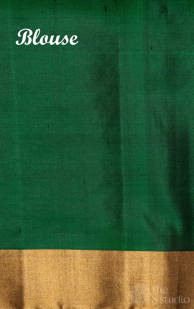 Sky blue ikat soft silk saree with contrast green border and pallu