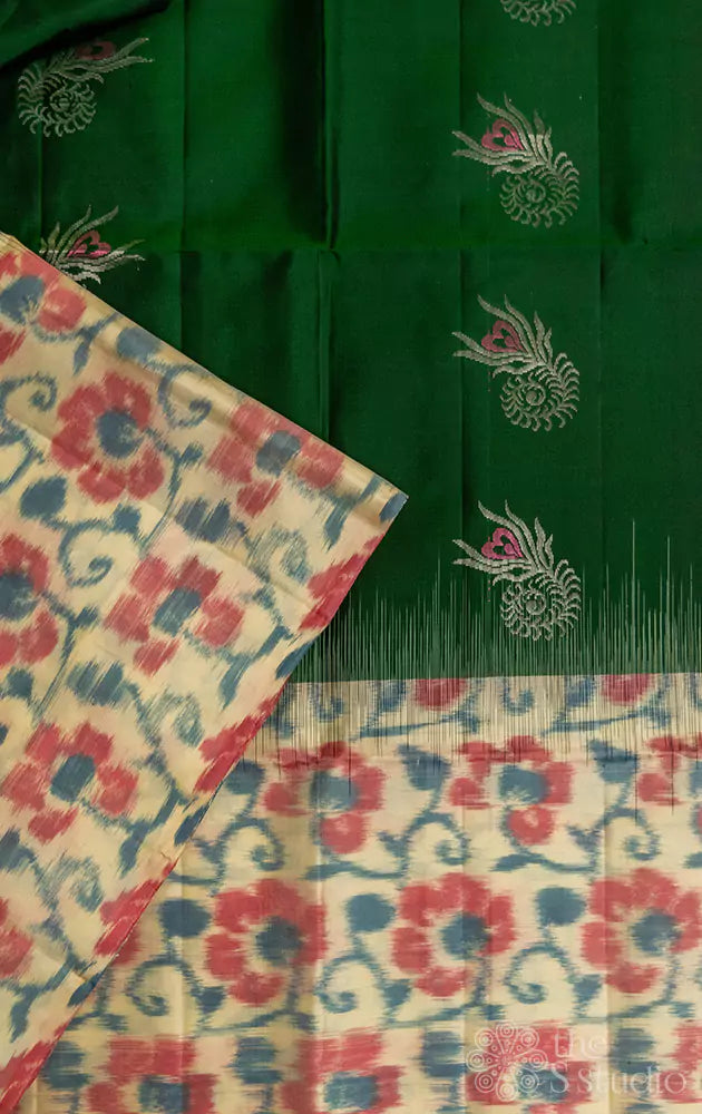 Green butta woven soft silk saree with long ikkat border and pallu