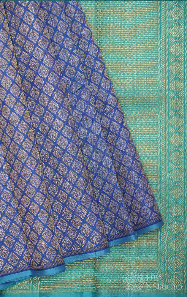 Cerulean blue kanchi silk saree with woven zari motifs