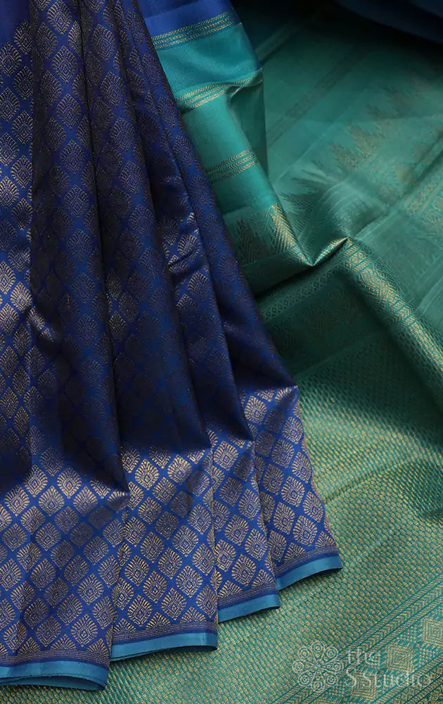 Cerulean blue kanchi silk saree with woven zari motifs