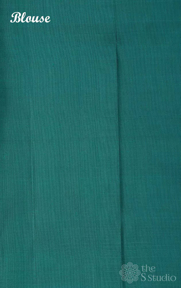 Cerulean blue kanchi silk saree with woven zari motifs