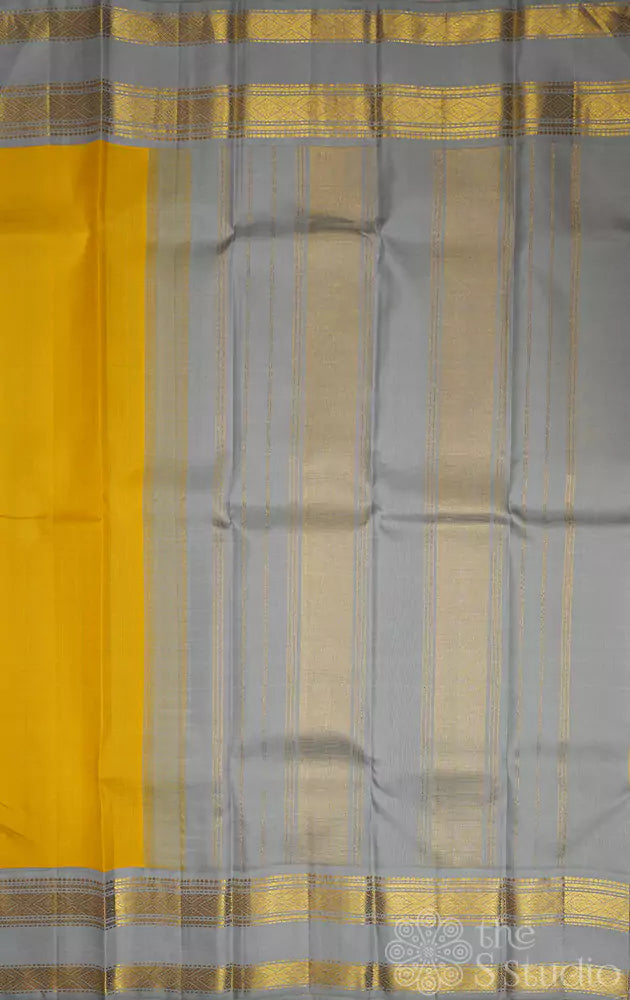 Lemon Yellow kanchi silk saree with rettapet korvai grey border