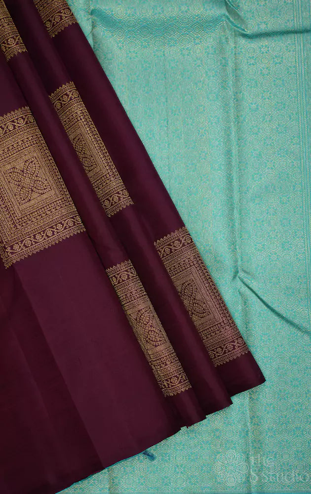 Burgundy kanchi silk saree with square buttas and sea  green pallu