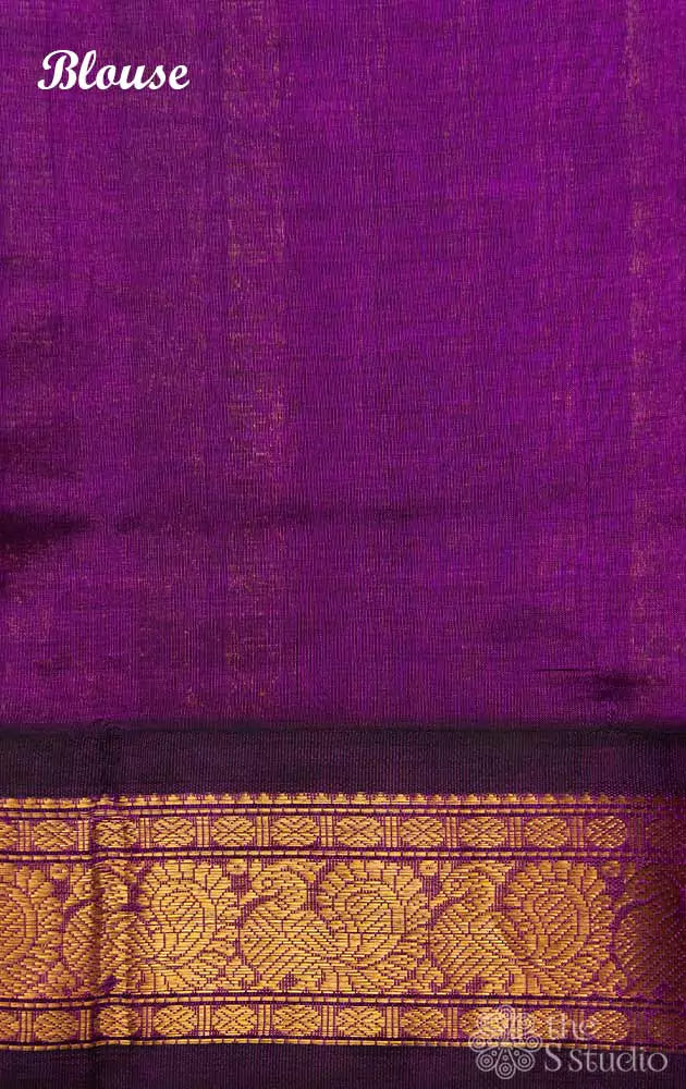 Sea green silk cotton saree with block print and purple border